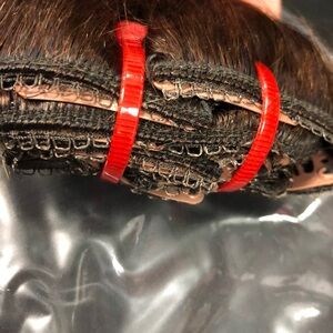 Brand new stylish clip in 20” 7 pieces color number 4. Human hair